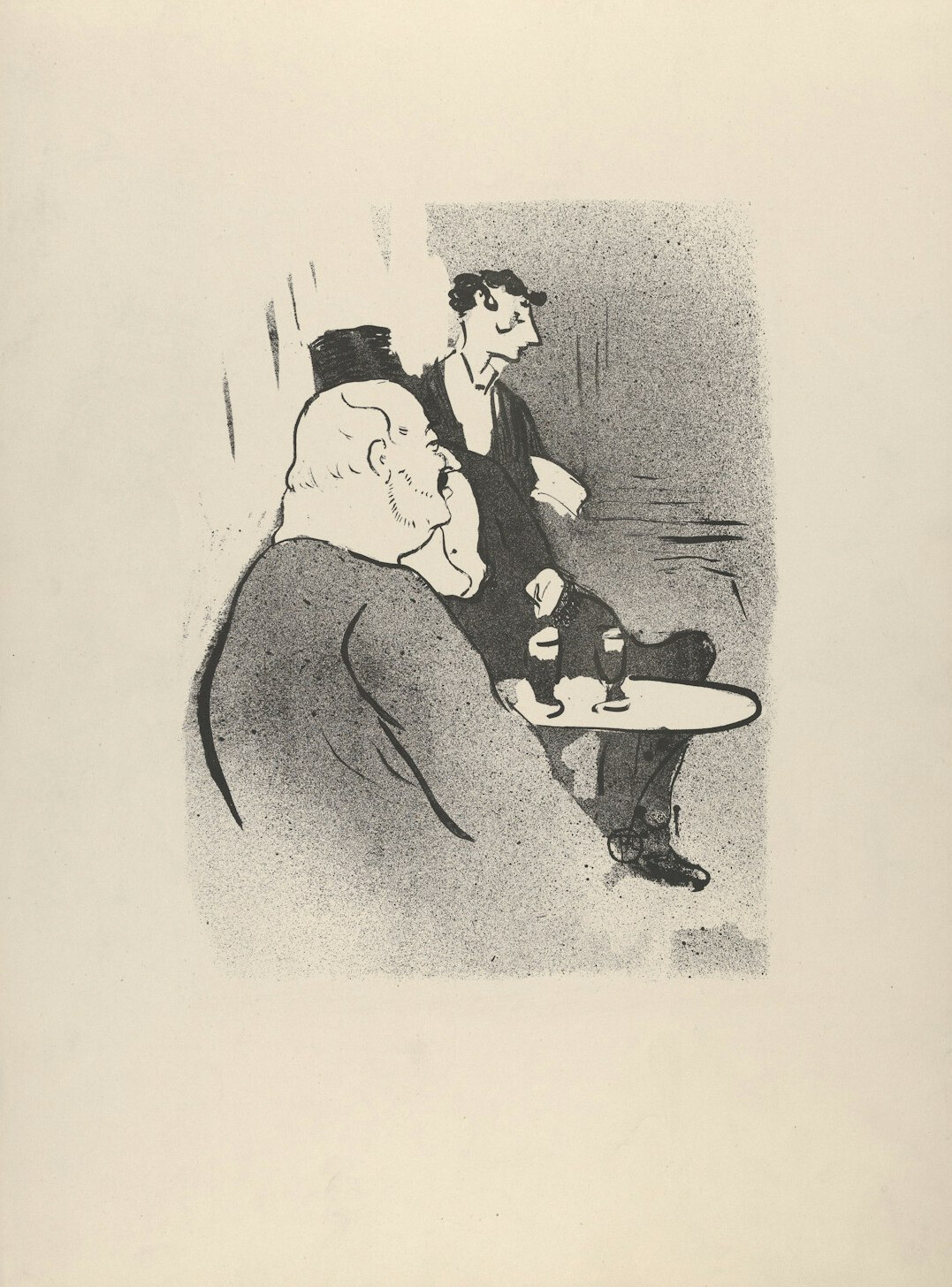 Counselor and senior man having a calm conversation at a table